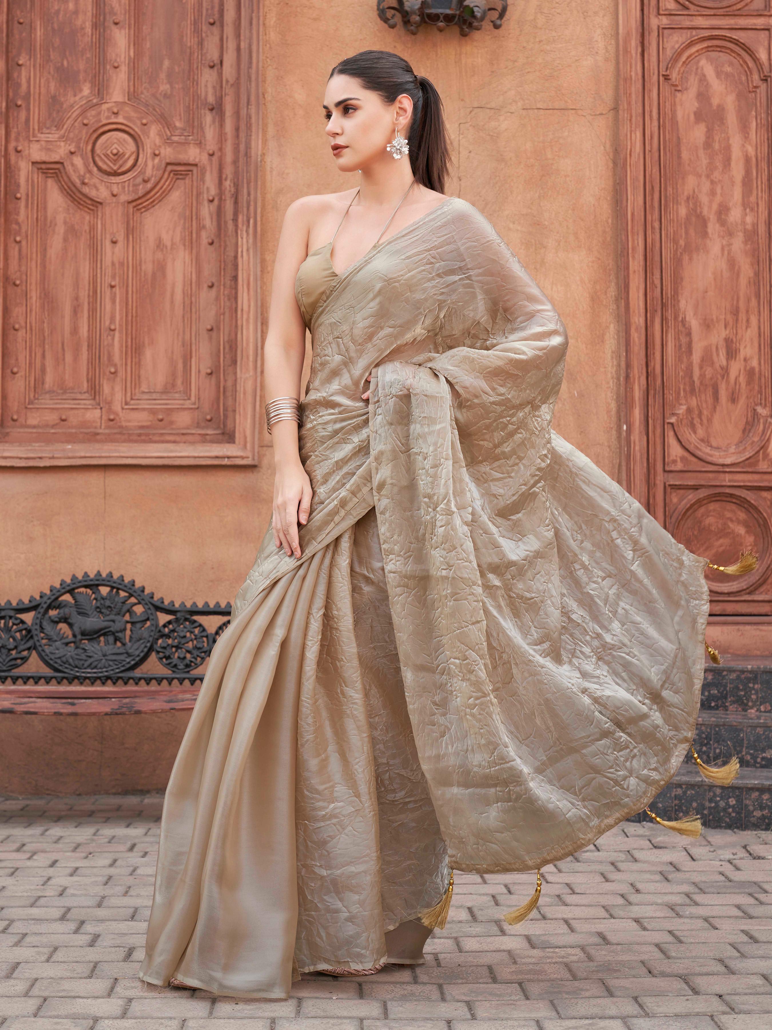 Beige colored crushed pallu burbery organza half and half saree